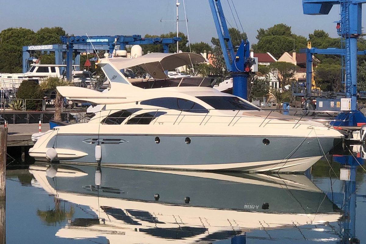 Exterior view of Lena, a Azimut 50 Flybridge yacht at Lignano Sabbiadoro / Lignan, Italy