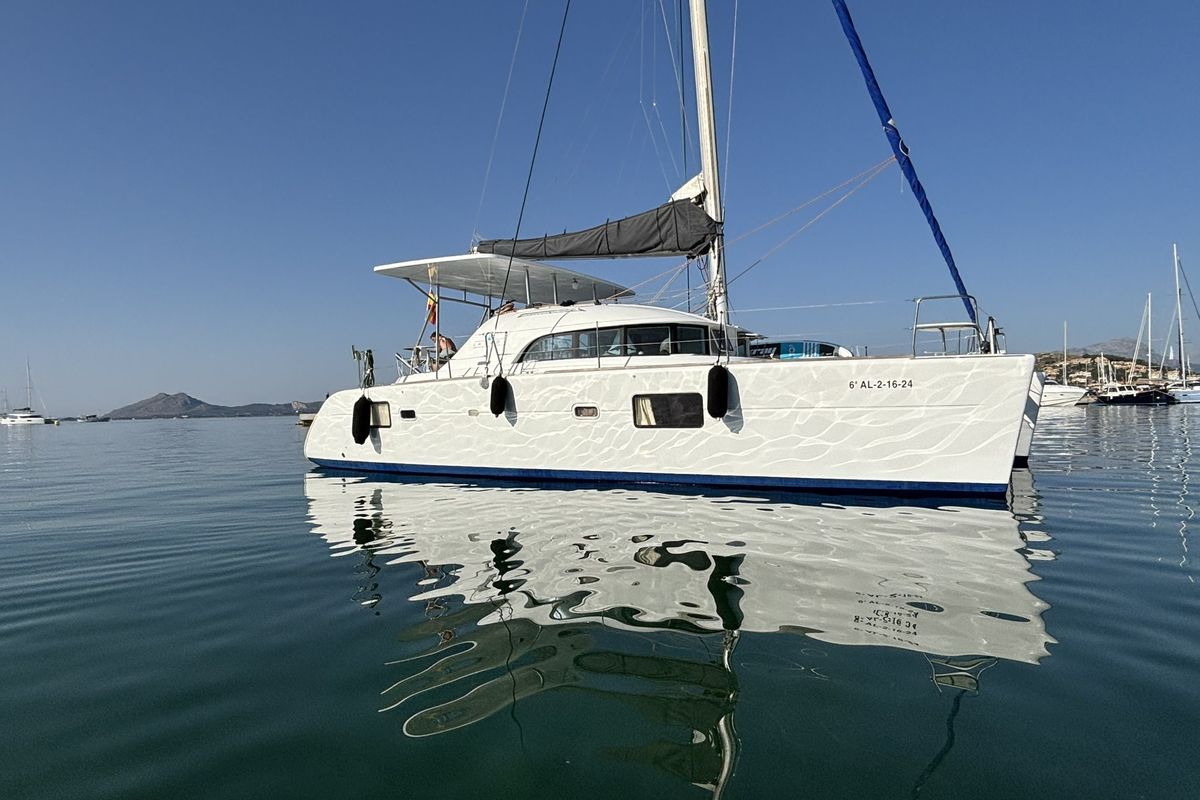 Exterior view of Mate, a Lagoon 380 S2 catamaran at Ibiza, Spain