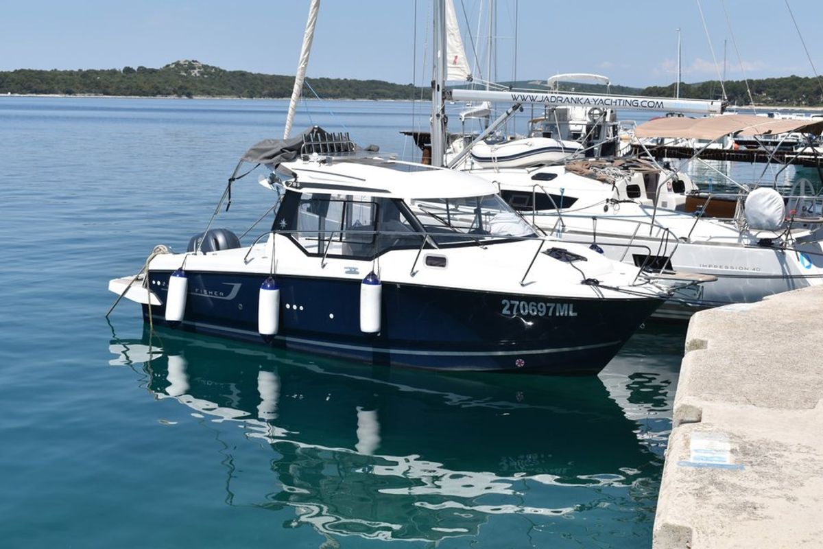 Exterior view of Posejdon, a Jeanneau Merry Fisher 795 motorboat at Mali Lošinj, Croatia