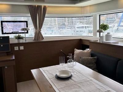 Salon of Jolie, a Lagoon 52F catamaran at Sant Antoni de Portmany, Spain