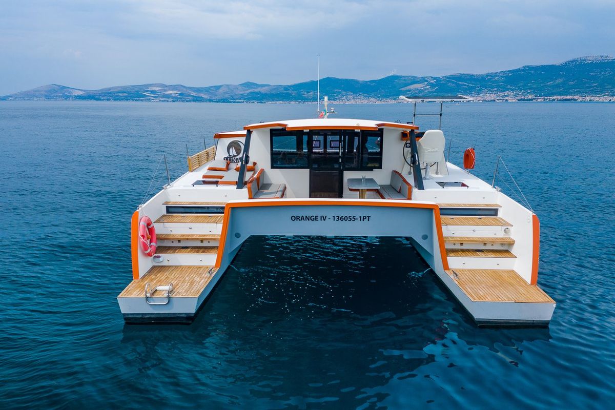Exterior view of Orange, a Luna 47 Power catamaran at Split, Croatia