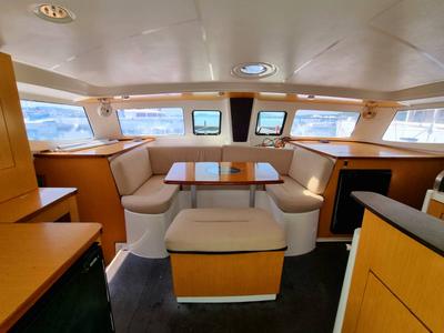 Salon of Happy Eva, a Fountaine Pajot Mahe 36 catamaran at Mai Khao, Thailand