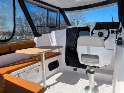 Cockpit of Holland, a Northman Nexus Revo 870 Prestige motorboat at Sztynort, Poland
