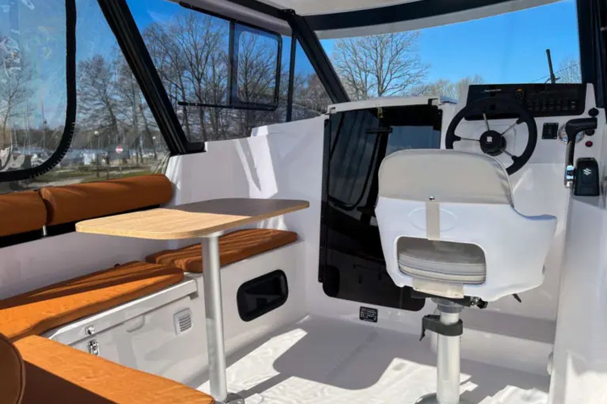 Cockpit of Holland, a Northman Nexus Revo 870 Prestige motorboat at Sztynort, Poland