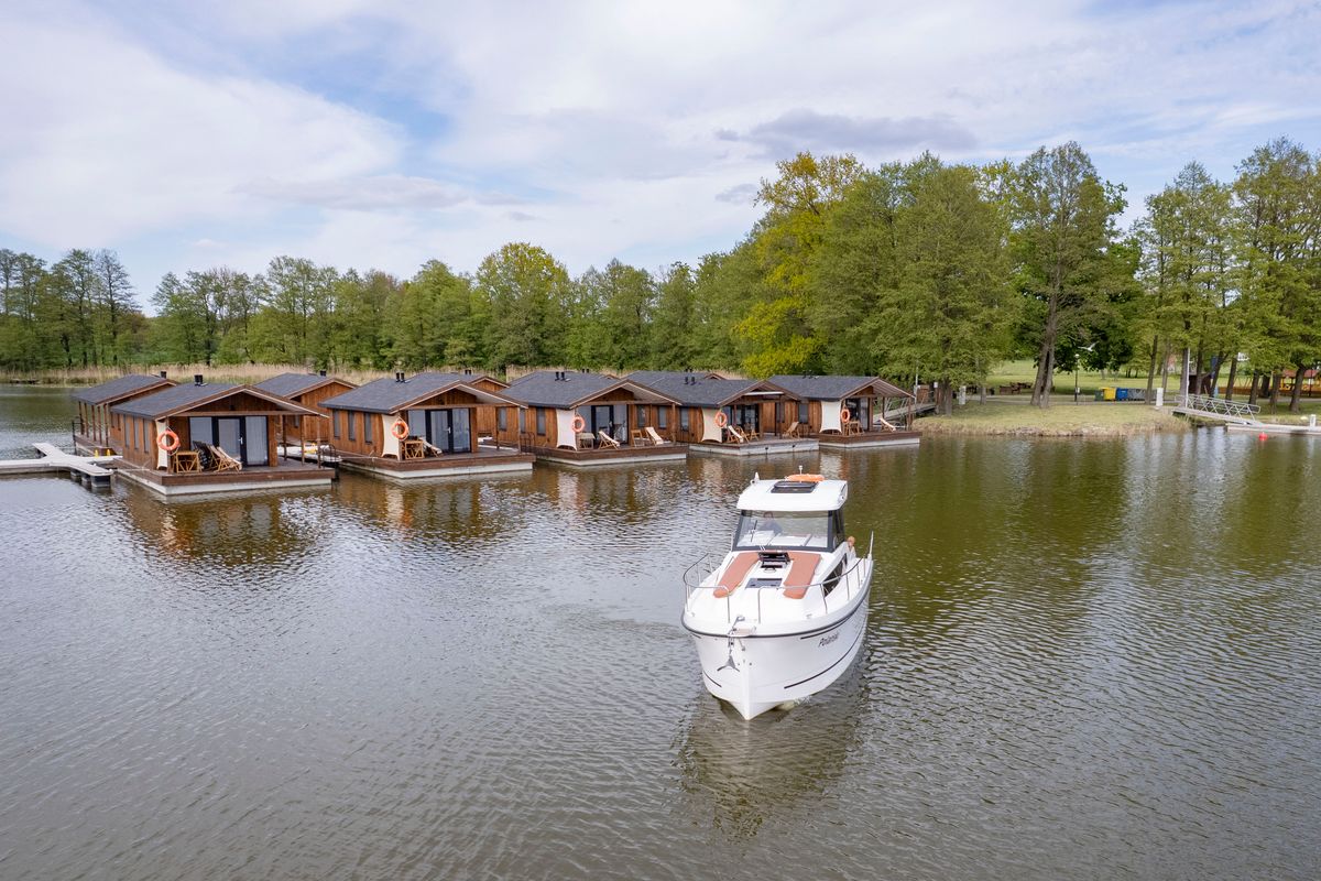 Exterior view of Holland, a Northman Nexus Revo 870 Prestige motorboat at Sztynort, Poland