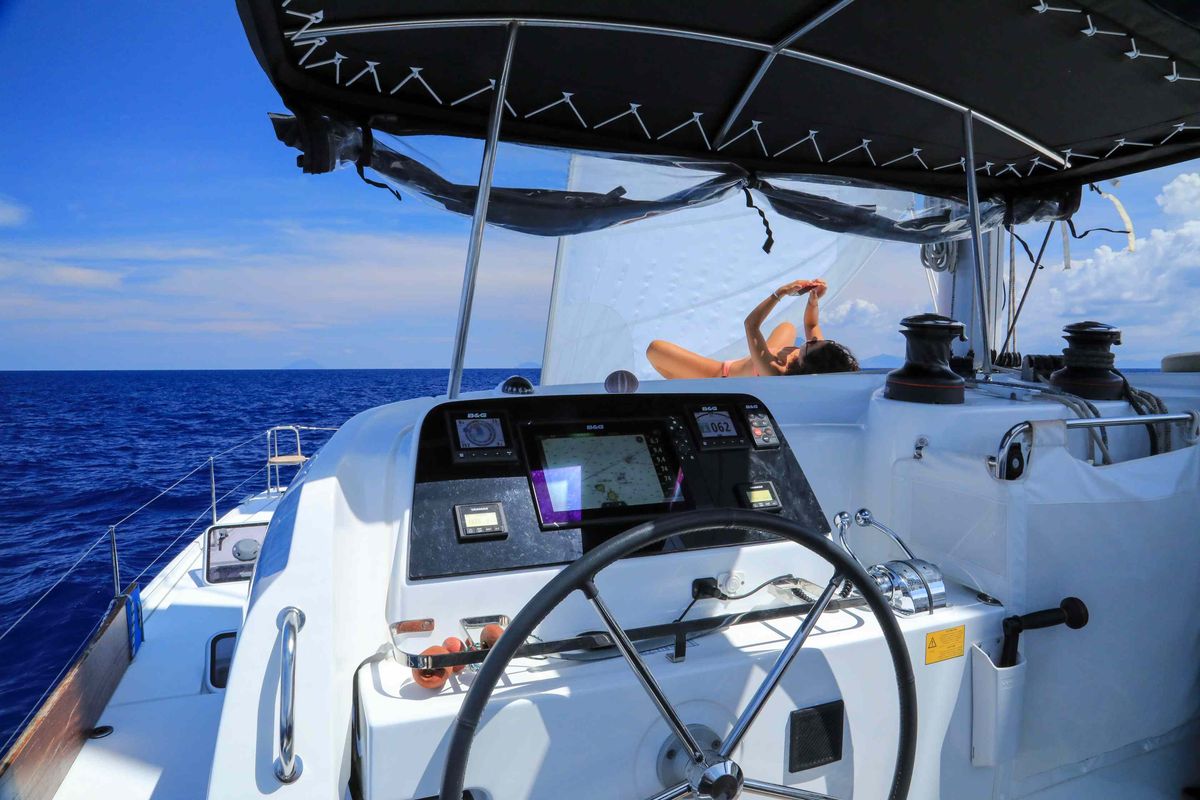 Cockpit of Easy to love, a Lagoon 42 catamaran at Tropea, Italy