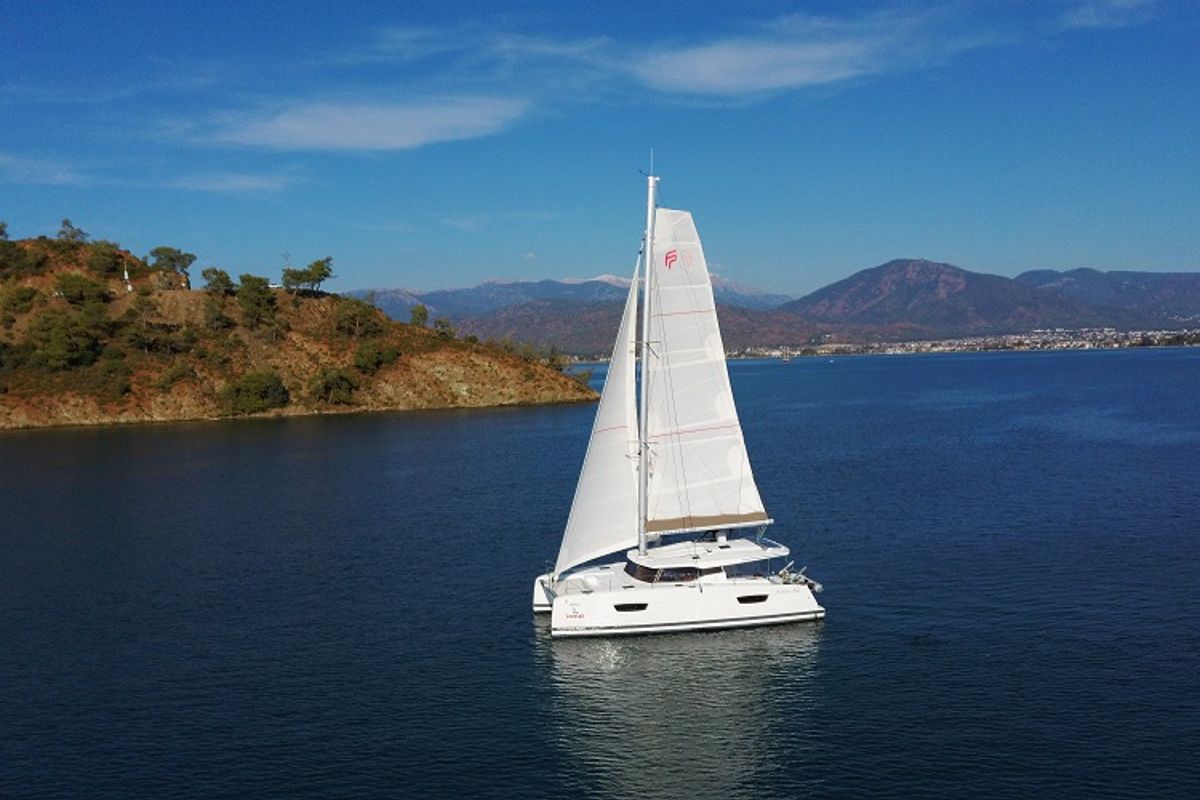 Exterior view of Reina, a Fountaine Pajot Astrea 42 catamaran at Fethiye, Turkey