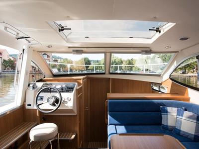Cockpit of E300-3, a Pénichette Europa E.300 motorboat at Loosdrecht, Netherlands