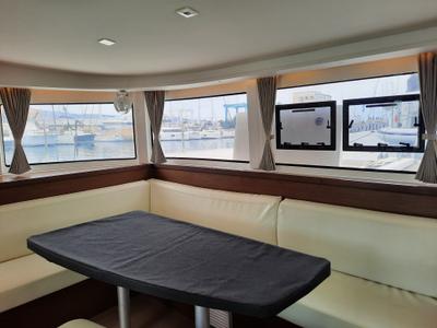 Salon of Senza Ma, a Lagoon 42 catamaran at Tonnarella, Italy