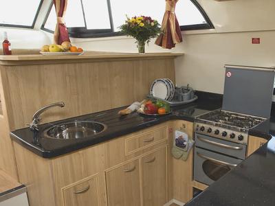Galley of Mystique - Comfort Plus 7, a Cygnet Mystique motorboat at Decize, France