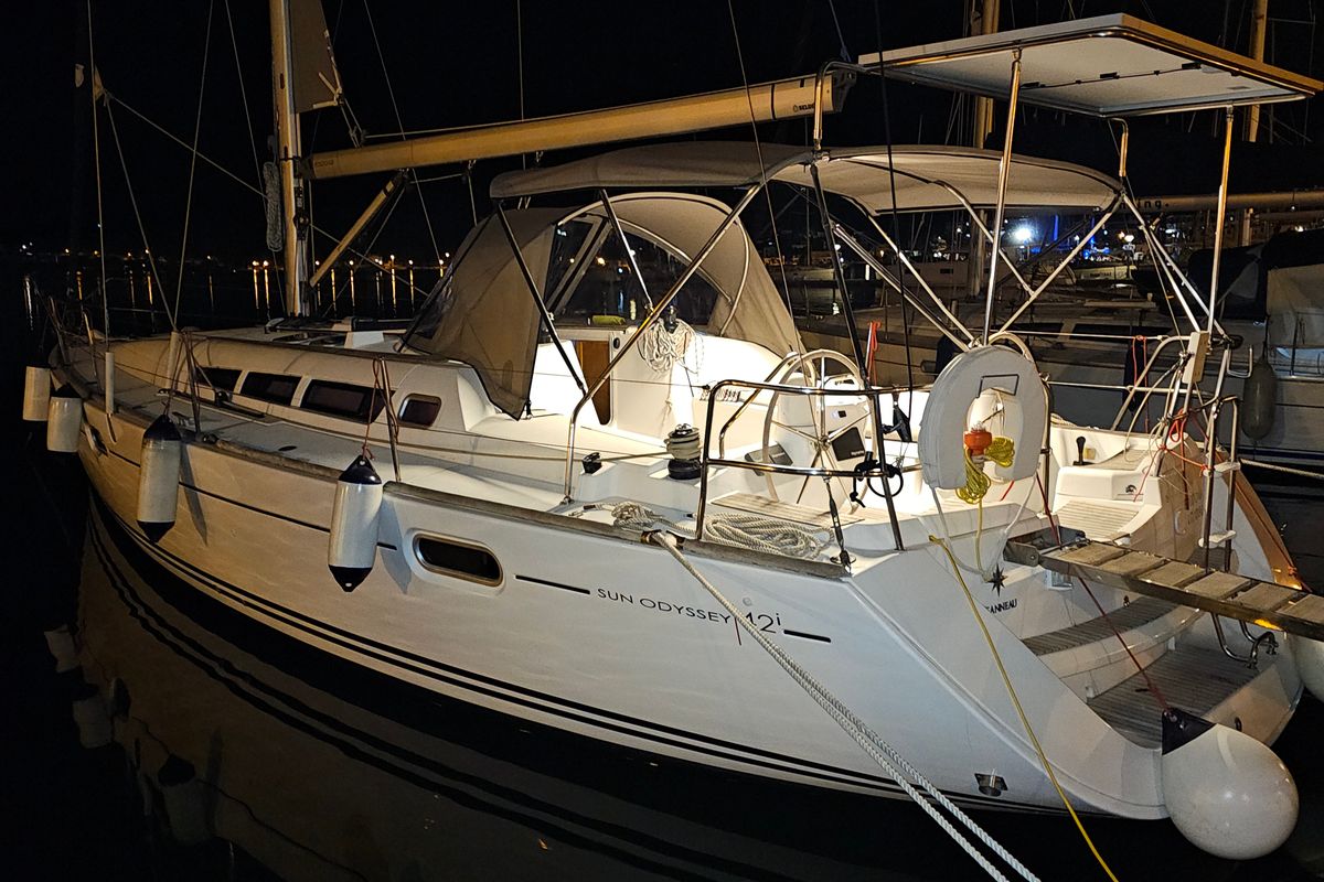 Exterior view of Comfort, a Jeanneau Sun Odyssey 42 i sailboat at Marina Delta Kallithea, Greece