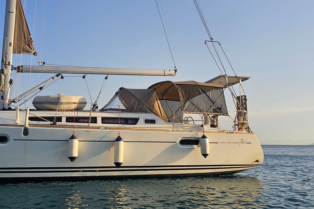 Exterior view of Comfort, a Jeanneau Sun Odyssey 42 i sailboat at Marina Delta Kallithea, Greece
