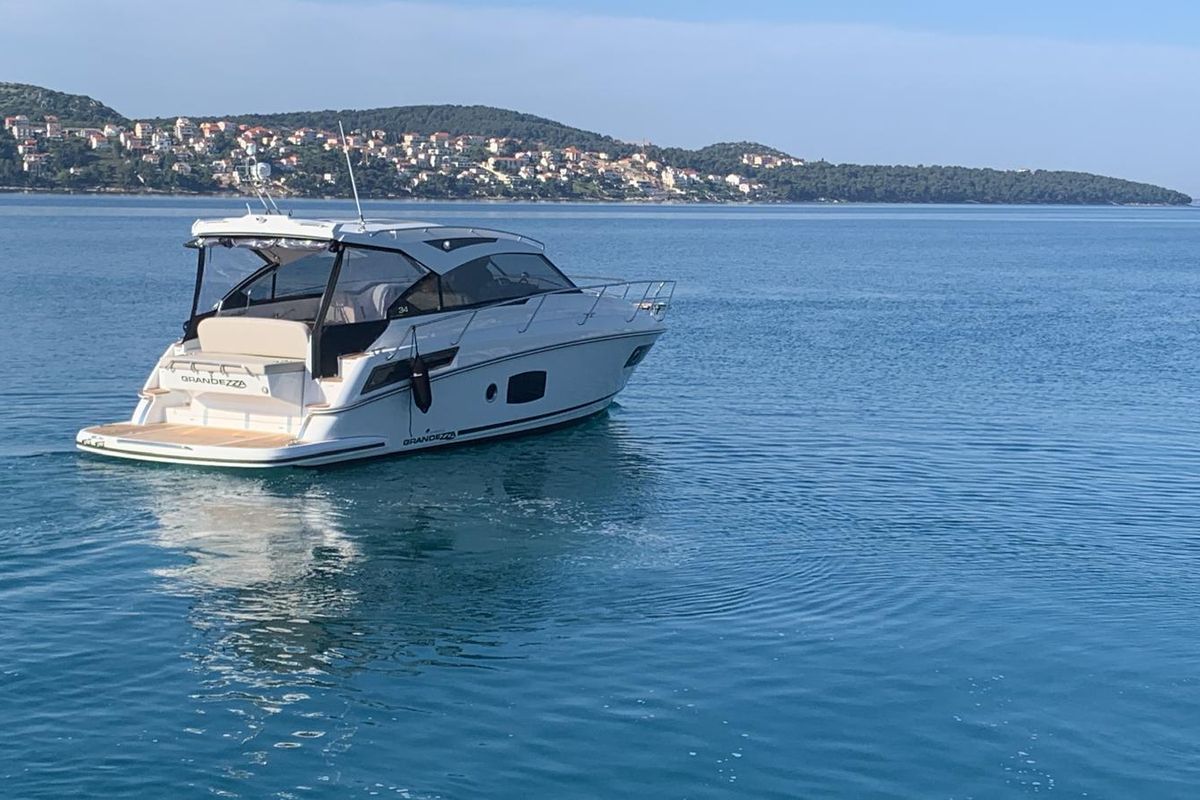 Exterior view of Ohana, a Grandezza 34 OC motorboat at Grad Trogir, Croatia