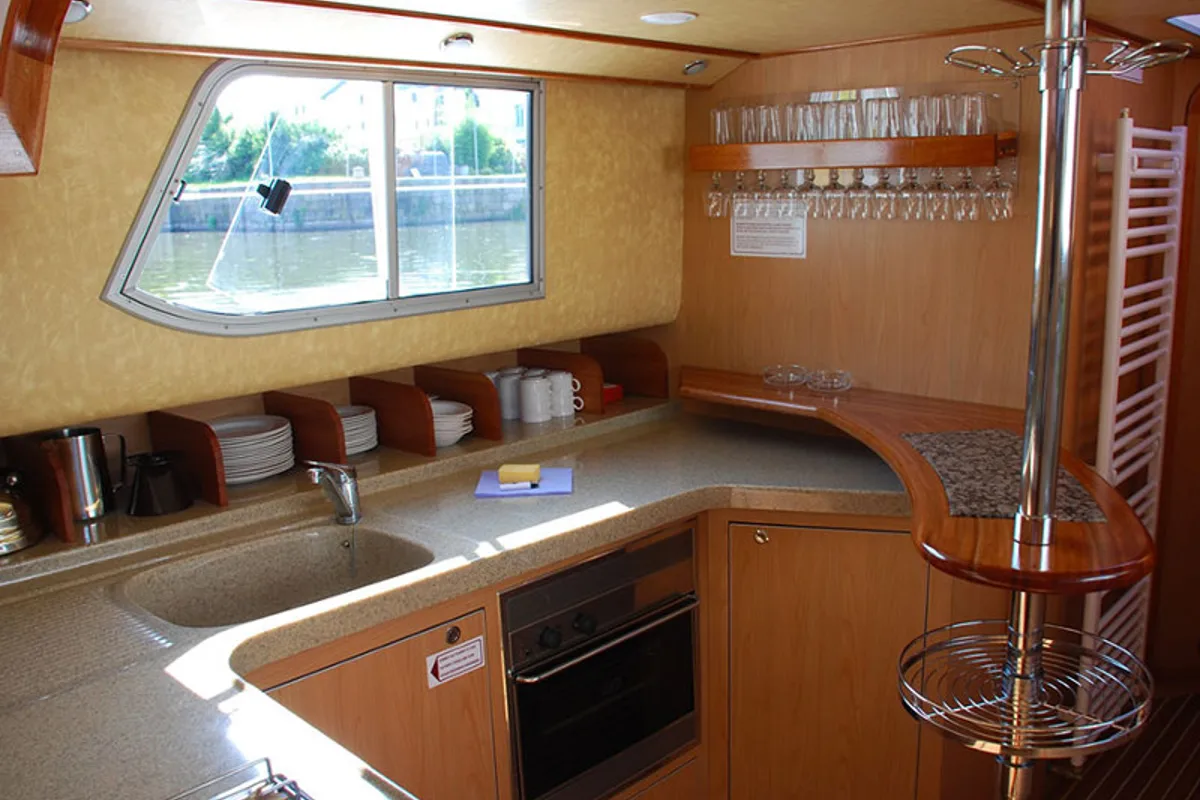 Galley of 150FB-14, a Pénichette 1500FB motorboat at Scey-sur-Saône-et-Saint-Albin, France