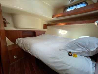 Cabin on Piano, a Nicols Estivale Duo motorboat at Grez-Neuville, France