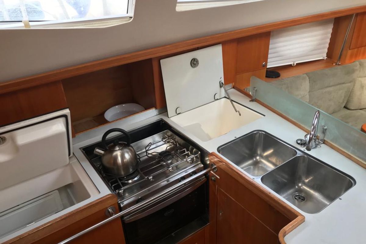 Galley of Alboran XXIV Cocomaluco, a Elan Impression 434 sailboat at es Jonquet, Spain