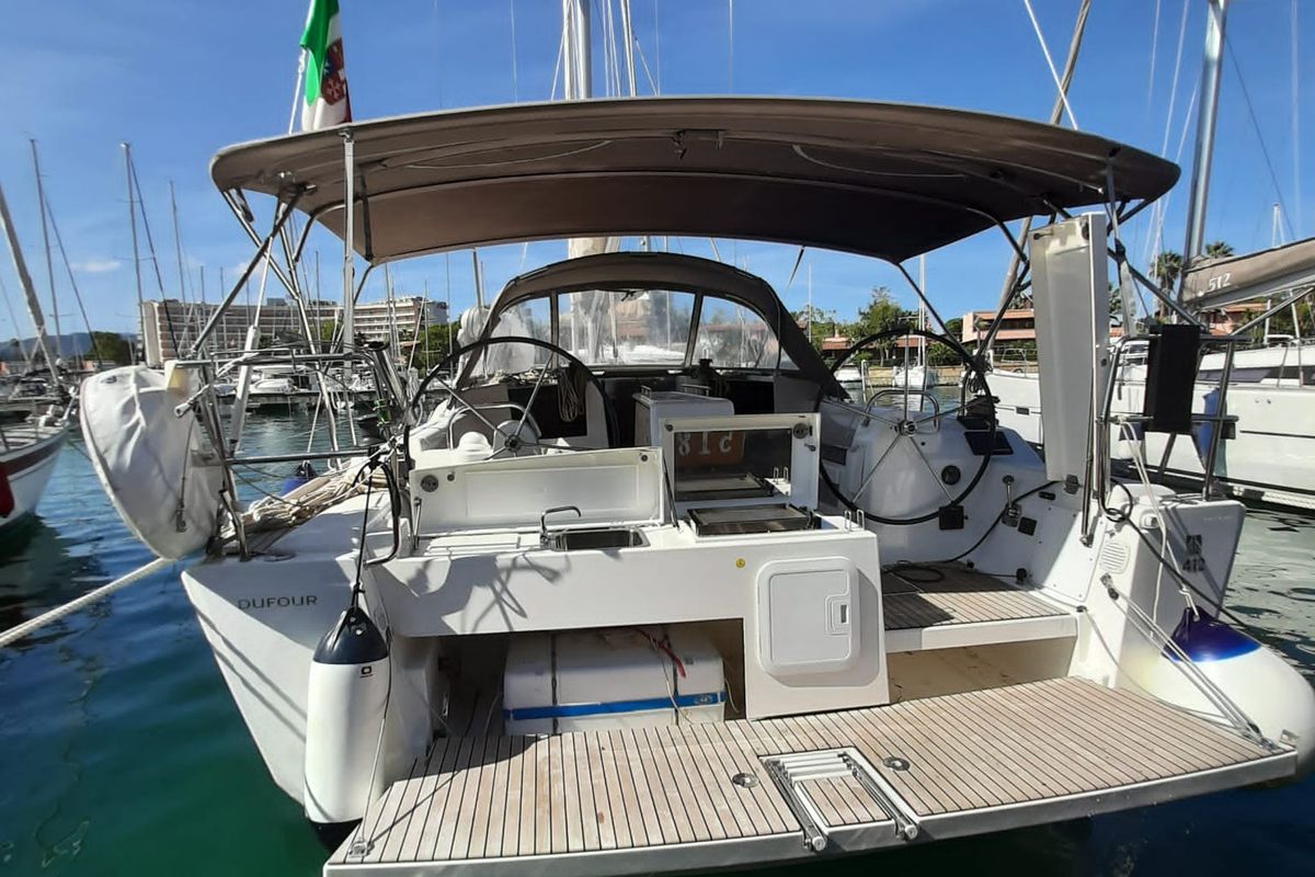 Exterior view of Hedone, a Dufour 412 GL sailboat at Tonnarella, Italy