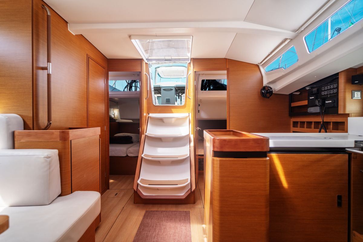 Salon of Indira, a Jeanneau Sun Odyssey 440 sailboat at Olbia, Italy