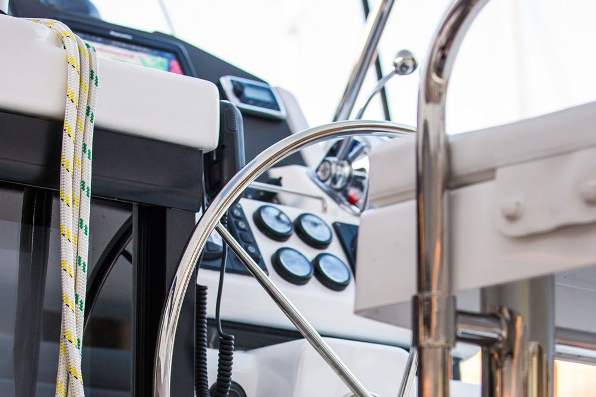 Cockpit of Sunsail 454 Classic, a Leopard 45 catamaran at Eden Island Marina, Seychelles
