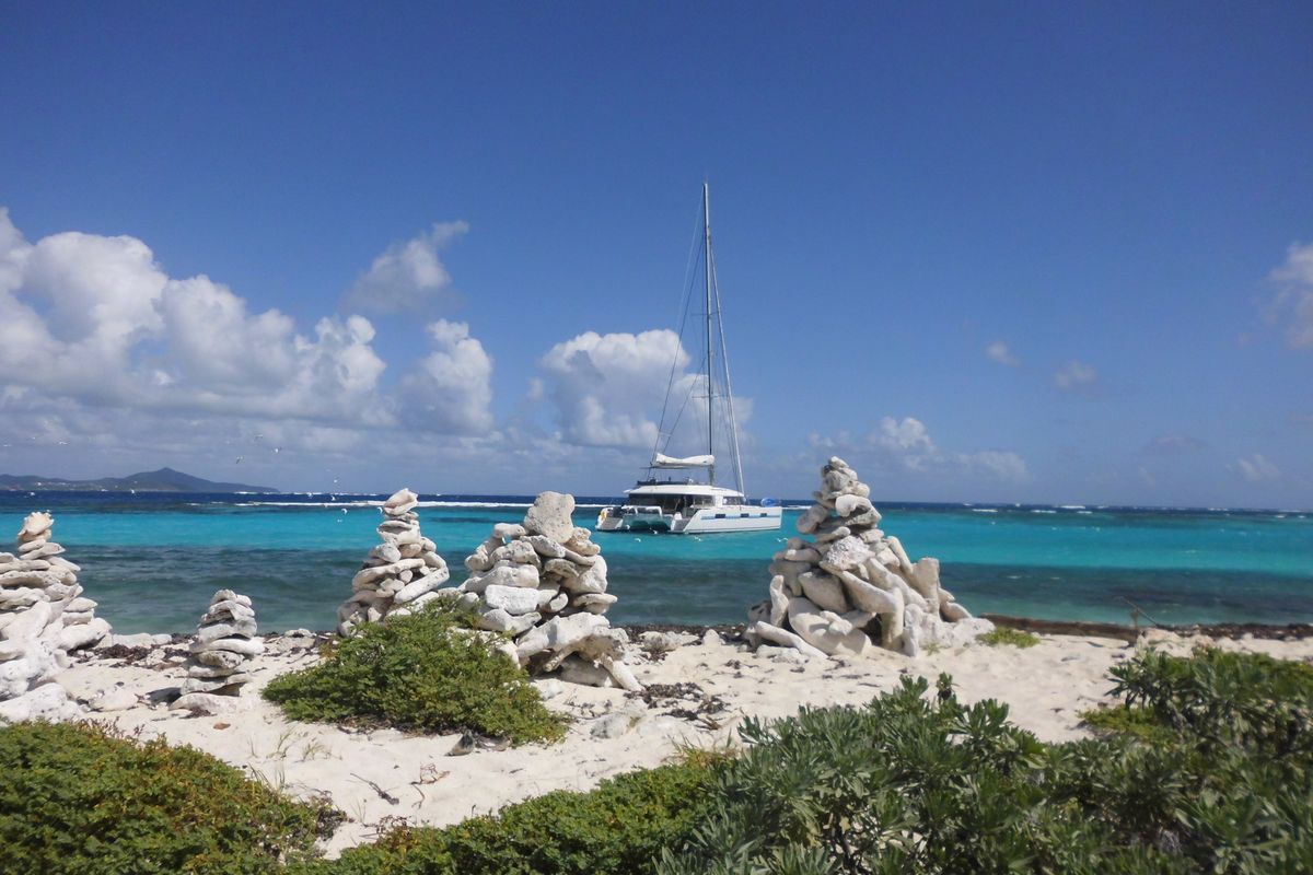 Exterior view of Marlena, a Lagoon 620 catamaran at Eden Island Marina, Seychelles
