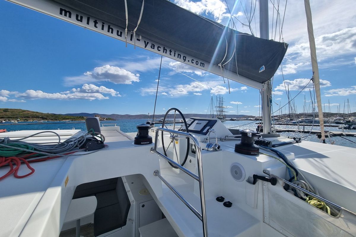 Cockpit of Lalouche, a Lagoon 450 F catamaran at Lavreotiki Municipal Unit, Greece
