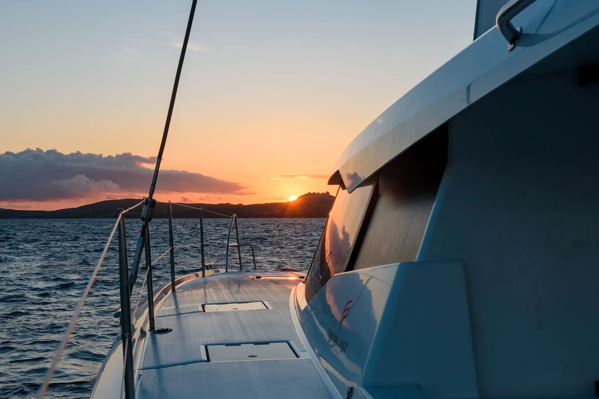 Exterior view of Agitation, a Fountaine Pajot Astrea 42 catamaran at Cannigione, Italy