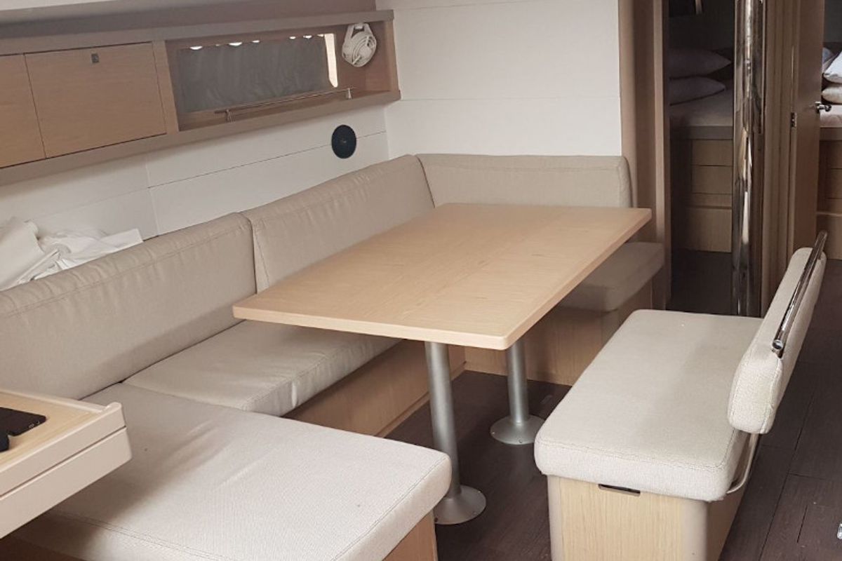 Salon of Orchidea, a Beneteau Oceanis 48 sailboat at Puntone di Scarlino, Italy