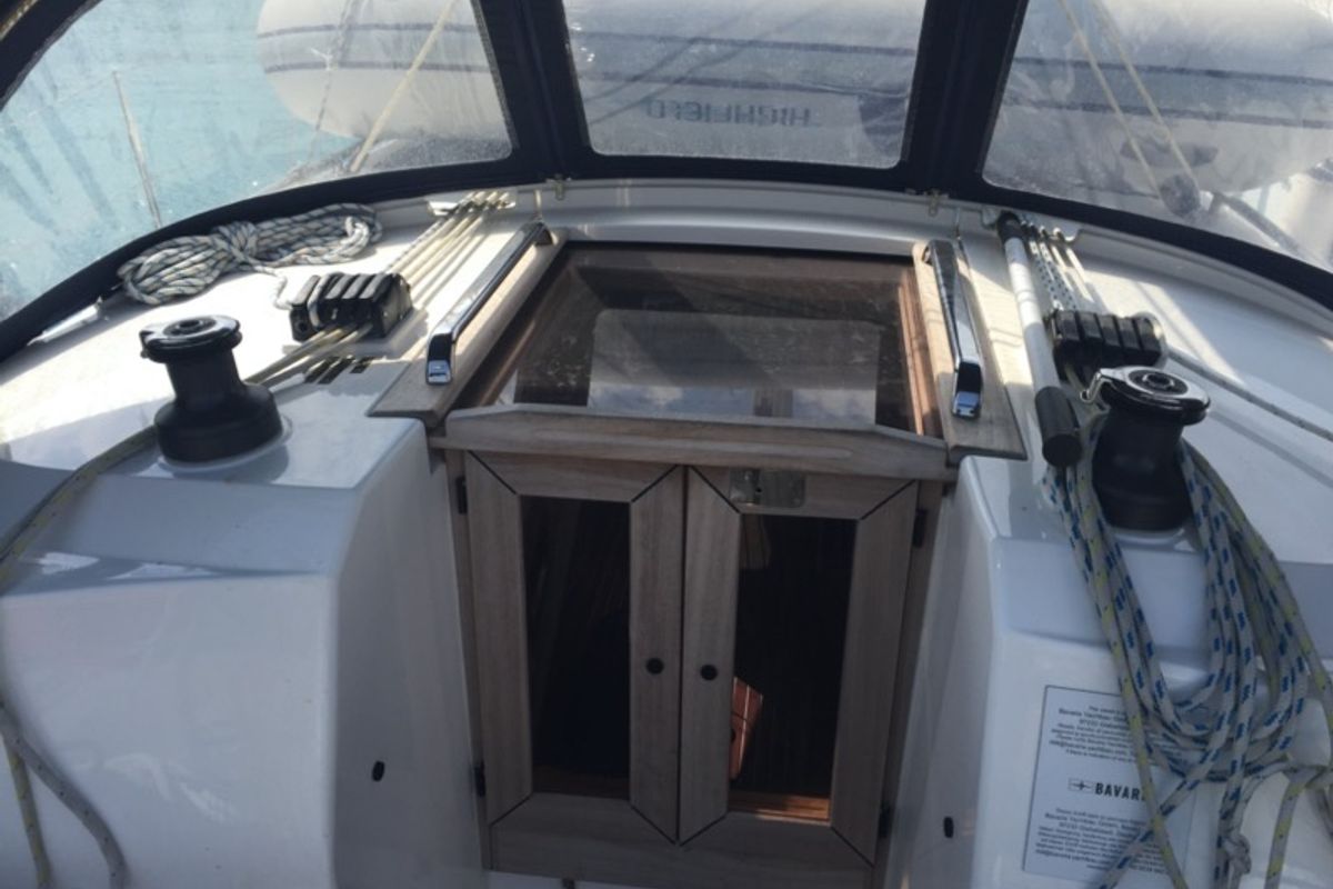 Deck of Menkar, a Bavaria Cruiser 37 sailboat at Olbia, Italy