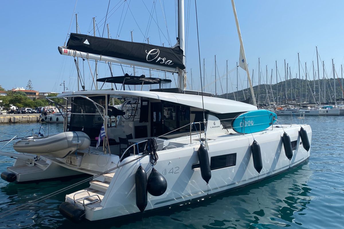 Exterior view of ORSA (AC/Gen/W.Maker, a Lagoon 42 catamaran at Skiathos, Greece