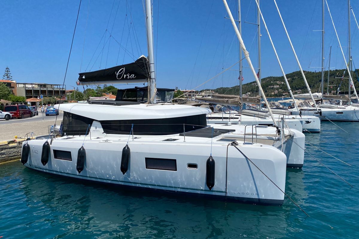 Exterior view of ORSA (AC/Gen/W.Maker, a Lagoon 42 catamaran at Skiathos, Greece