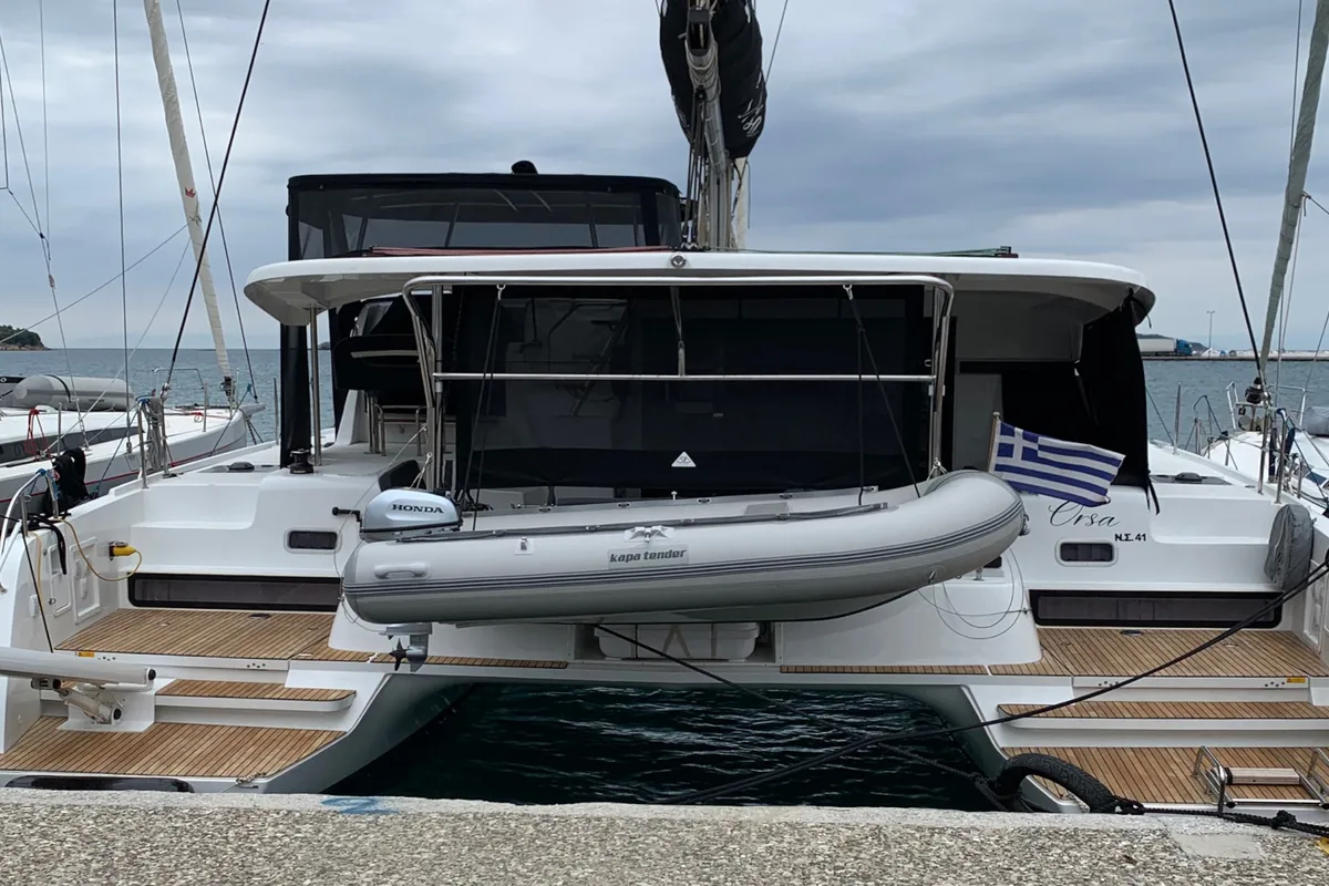 Exterior view of ORSA (AC/Gen/W.Maker, a Lagoon 42 catamaran at Skiathos, Greece