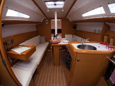 Salon of Mare Doro, a Jeanneau Sun Odyssey 33i sailboat at Marina Delta Kallithea, Greece