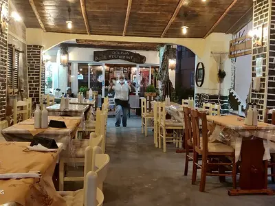 Dolphins Taverna - Photo 1