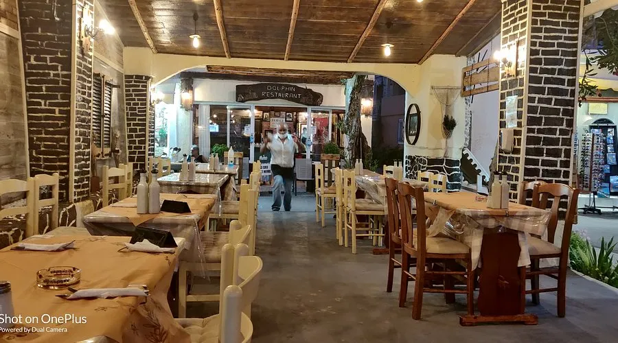 Dolphins Taverna - Photo 1